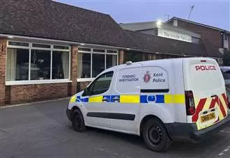 Forensics officers spotted after police called to hotel