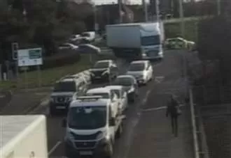 Man injured after ‘stolen’ Porsche crashes in police chase sparking gridlock